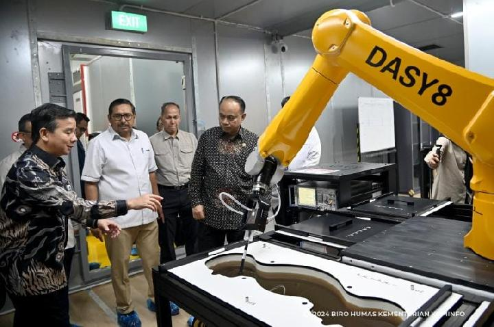 Otomasi robotik di fasilitas pengujian